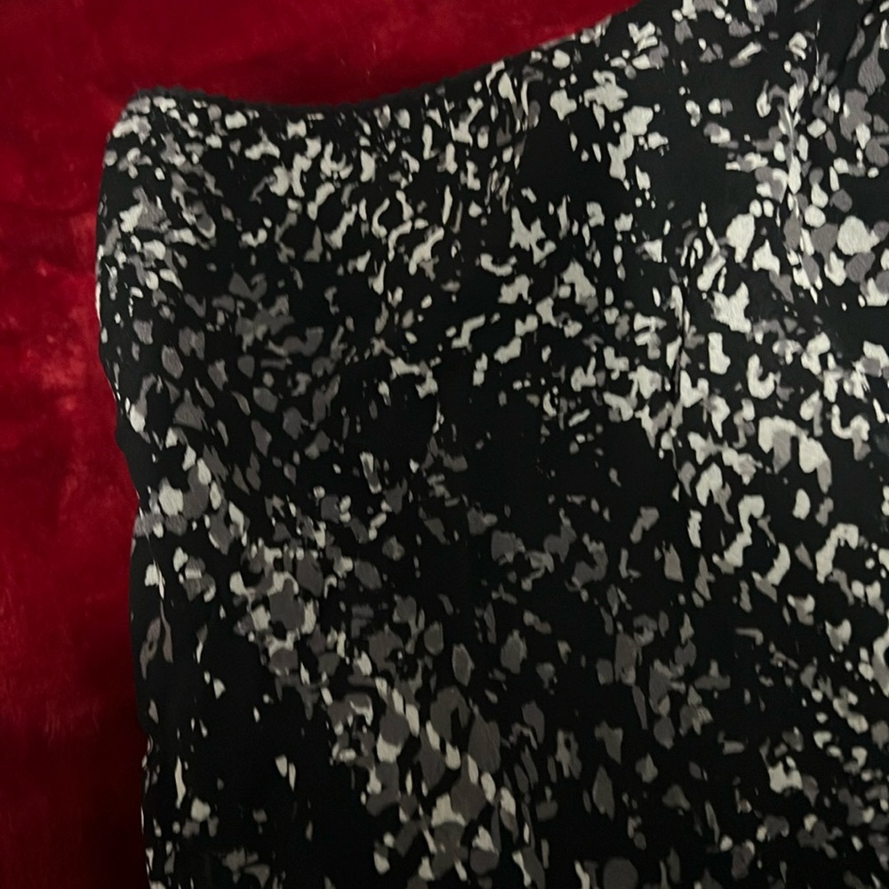 Black and white speckled women’s skirt. Light weight. Excellent condition.